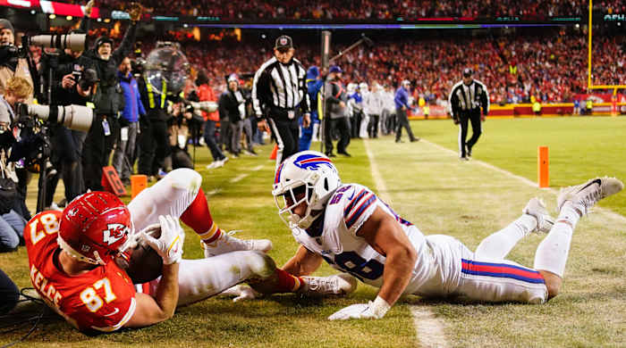 Kansas City Chiefs tight end Travis Kelce (87) scores the game winning touchdown against the Buffalo Bills during overtime in the AFC Divisional playoff football game